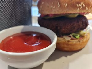 Veggie burger and ketchup at  Broccoli Restoran in Novi Sad