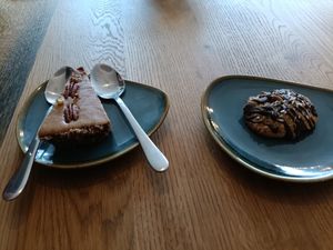 Raw pecan slice on left, dark choc ginger cookie on right at Little Collins CBD  in Dublin
