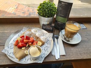 Crèpes with strawberries, banana, vegan chocolate, whipped cream an ice cream at Crepeaffaire in Brighton