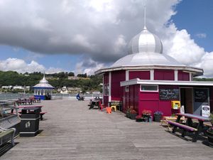 The pavilion building and terrace around at Pier Pavillion Tea Room in Bangor