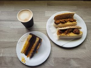 Oat Flat White, Vegan Chocilate Orange Cake and Falafel and Hummus Panini #Veganuary at Pier Pavillion Tea Room in Bangor
