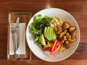 Vegan buddha brunch - scrambled tofu, spiced potatoes, avocado, roasted chickpeas, salad  at TAN HOSTEL x CAFE in Ao Nang
