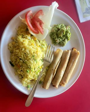 Vegan flautas de zanahoria con arroz y guacamole   at Om Burger Rincon Vegetariano in Zacatecas