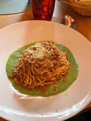Vegan spaghetti bolognese on pea cream  at Il Piatto Sbeccato in Udine