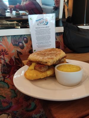 Full farl sandwich with bacon, hash browns and sausage £9 gbp at Harry's at 387 in Belfast