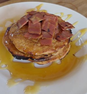 Harry's pancake stack with maple syrup and crispy facon at Harry's at 387 in Belfast