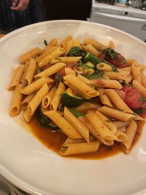 Pasta with tomatoes butter, asparagus, zucchini and cherry tomatoes. Loved it too  at 1910 in Degania Alef