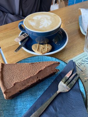 Chocolate pie, cappuccino with pea milk  at Lagom in Amsterdam