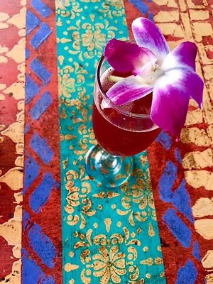 Chicha juice, an ancient Inkan elixir meant to keep you young and help lose weight.  Fresh & simple purple corn, pineapple and apple with hint of cinnamon. at Qusqo in West Los Angeles