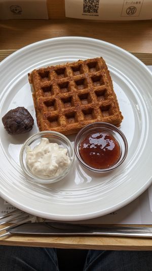 Brown rice waffle, red bean jam, strawberry jam and whipped soy at Genmai Cafe in Osaka