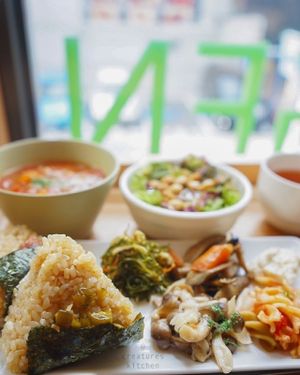 Shokujidouzen lunch set with brown rice onigiri, minestrone soup, salad, brown rice tea, and deli items.  at Genmai Cafe in Osaka