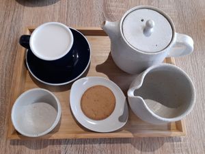 Tea set. Black rose with almond milk at Jing Si Books & Cafe  in Salisbury