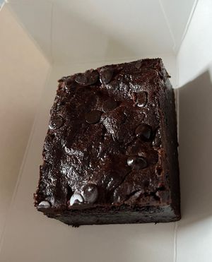 Takeaway fudgy chocolate brownie   at Jing Si Books & Cafe  in Salisbury