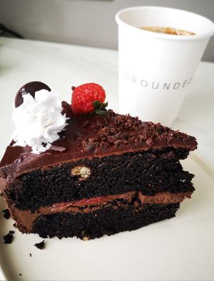 Iced Chai Latte and a SLAB of divine chocolate cake! at Grounded  in El Nido