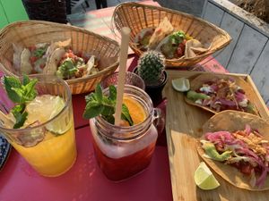 Tostada grilled watermelon + taco chorizo tofu & papas + taco cashew & cauliflower    at Mexcalli in Ghent