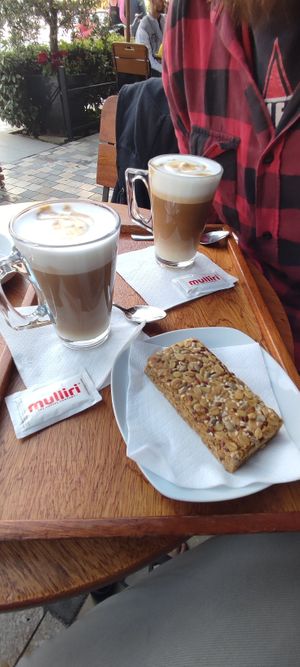 Coffee with soy milk and a grain/nuts snack. at Mulliri Vjeter in Vlore
