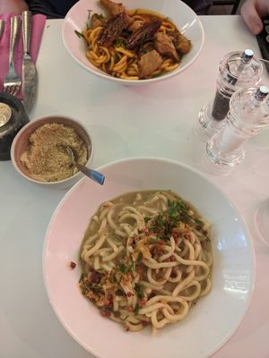 The photo shows the bowl of cashew parmesan they bring to the table at Pastan Barcelona in Barcelona