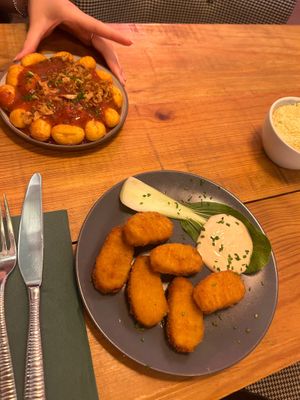 heura nuggets and gnocchi with pormodoro sauce at Pastan Barcelona in Barcelona