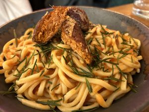 Catalunya - cheese and tomato sauce, spiced with harissa and topped with kale and 'chorizo'.  at Pastan Barcelona in Barcelona