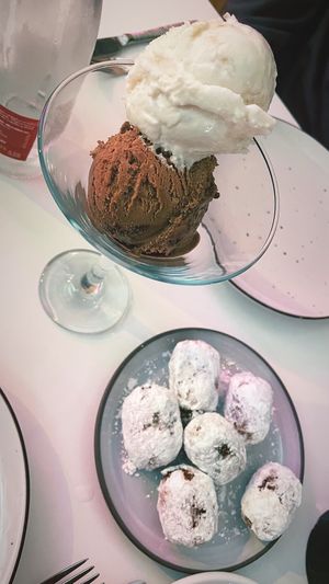 Filled mini donuts and choco-hazelnut and coconut ice cream 😍  at Pastan Barcelona in Barcelona