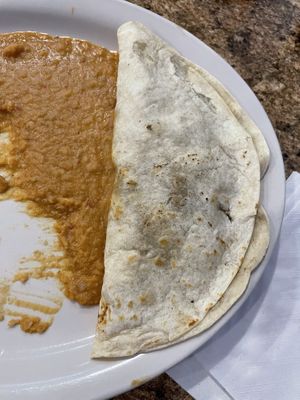 Vegetarian E - Dry Grilled no Cheese with refried beans no cheese. I forgot to take a photo before digging in. Lol  at El Rio Grande Mexican Restaurant in Lumberton