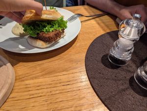 Disappointing veggie burger consisting of falafel, lettuce and a side of hummus. at Martinerhof's Brauhotel in St Martin In Passeier