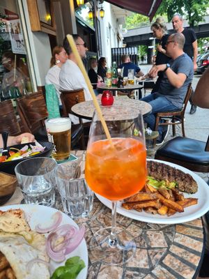 Aperol Spritz with a pasta-straw - great idea at Terzo Mondo in Berlin