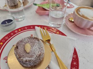 Strawberry art cake and capuccino at Aj Zdravo Coffee and Cake Shop in Novi Sad