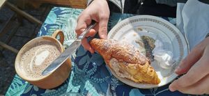 Vegan croissant with fake nutella (my son has nut allergy), and vegan hot chocolate! at Les Ursulines in Dieppe