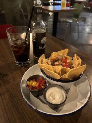 Cheesy nachos with sour cream and salsa  at The Flying Duck in Glasgow