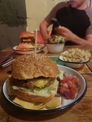 The brooklyn burger with cajun bean patty, side of mac and chilli nachos at The Flying Duck in Glasgow