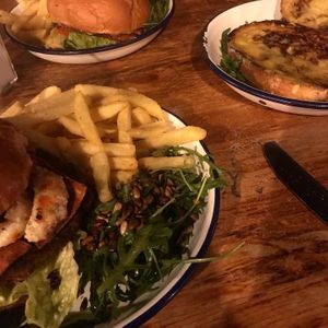 Shrimp and chorizo burger, colonel chipotle burger and a side of cheesy garlic bread  at The Flying Duck in Glasgow