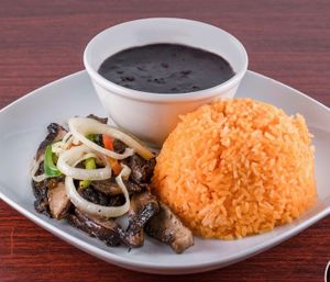 Rice beans and mushrooms with onions and peppers. at The Vegan Factory in Linden