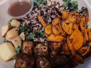 Custom Harvest Bowl: kale, wild rice, apples, sweet potato, tofu, almonds, and balsamic vinaigrette at sweetgreen in Schaumburg