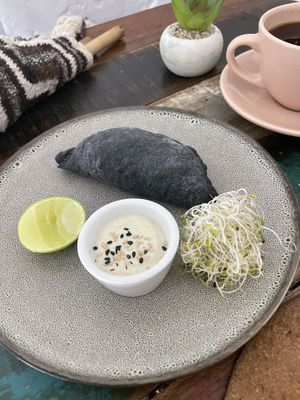 Charcoal empanada - dry outside  at Satiba Therapy Coffee Shop in Arequipa