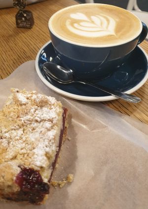 cheery crumble and oat cappu at Pure Origins Estate Coffee in Berlin