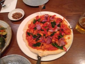 Vegan pizza w/ no vegan cheese at Bella Italia in Inverness