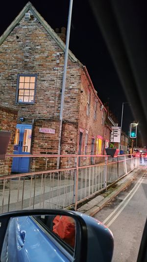 Here were come, Junk Bar! (Entrance from courtyard) at Junk Soul Smothered Bar & Grill in Beverley