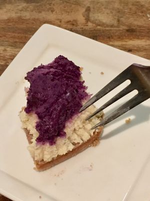 Half eaten raw blueberry cheesecake  at The Living Cafe in Central Singapore