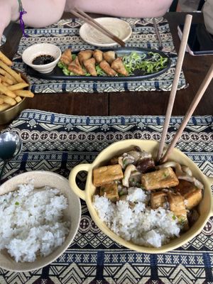 Mountain spice tofu with rice. My friend got the vegan dumplings and potato chips    at ChuSu Kitchen in Lao Cai