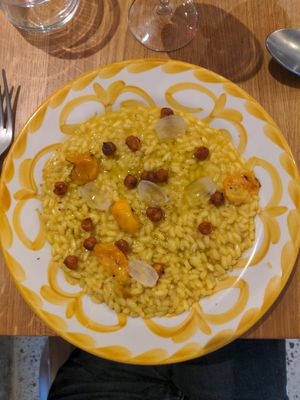Risotto with safran, oignons, roasted chickpeas and tomatoes at V'italian in Copenhagen