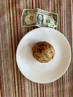 Spicy chubby (next to dollar bill, to give you an idea of its size). at Revelstoke Coffee in Concord