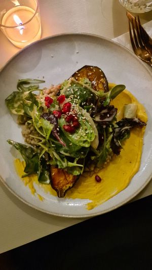 Miso Glazed Aubergine on creamy butternut at Gratitude Restaurant in Munich