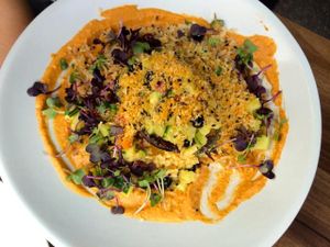 Main lunch dish with grilled avo, yummy sauce, hummus...  at Gratitude Restaurant in Munich