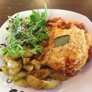 aubergine and millet gratin with potato wedges  at Natura Cafe in South East London