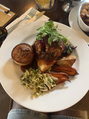 Vegan Nut Roast with Rosemary & Garlic Roast Potatoes, Maple Roasted Carrot, Braised Red Cabbage, Seasonal Greens, Vegan Yorkshire Pudding & Gravy  at The Lamplighter in Northampton