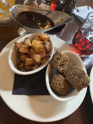 Maple & Wholegrain Mustard Parsnips + Sage & Onion Stuffing + Vegan Gravy + Vegan Cherry Ciderr  at The Lamplighter in Northampton