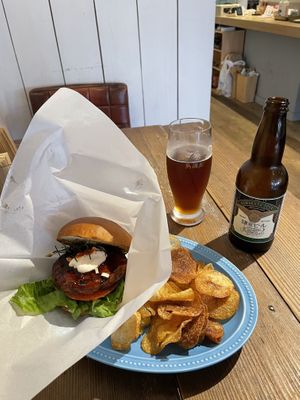 Gammo teriyaki burger with potato chips and beer (came to ¥2760 at time of writing)  at Luna Burger  in Kamakura