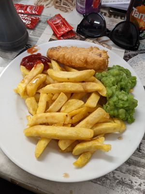 Vegan battered sausage and chips at Holt Fish Bar in Holt