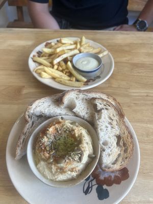 The sourdough bread was sooo good. The hummus as well. But the bread was the star. The french fries with homemade saus was also good  at Phyto Bistro in Nha Trang